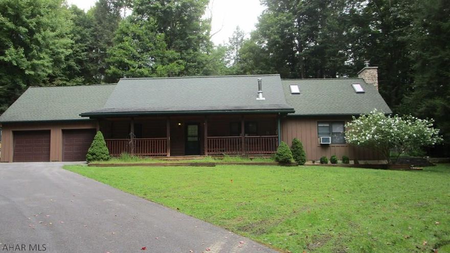 Two bedroom log home with huge great room.  This classy residence can be your full time home or getaway.  Already being used as a vacation rental, this property allows those for whom it would be a second home to use at their leisure and cover their costs with rental revenue.  Large yard with gardens, pond and hot tub is a mecca for wildlife.  Bedroom on first floor has an attached dressing room / closet.  Upper master bedroom has its own sitting room and balcony overlooking the backyard.  Both bathrooms are elegantly decorated.  The kitchen is a visual delight as well as functional.  Home is located in Glendale Yearound, a gated recreational community adjacent to Prince Gallitzin State Park / Glendale Lake / State Gamelands 108.  Six miles from Rock Run ATV Park.