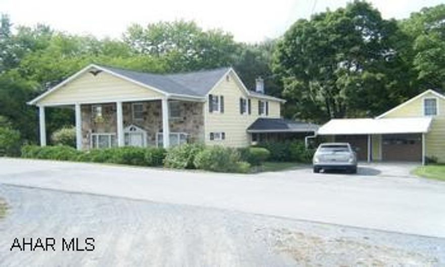 2 story home with attached garage. Private rear yard borders creek. Attached 2 car garage. Home has large rooms. Carpeting is less than 1 year, home interior is repainted. Original home is the front portion, no age known. The rear 1/2 was built around 1977. The interior condition is good. The exterior is circa 1977. The home is in a flood plain. Last flood was 1993 and flooded the basement. This home has much to offer for this price.