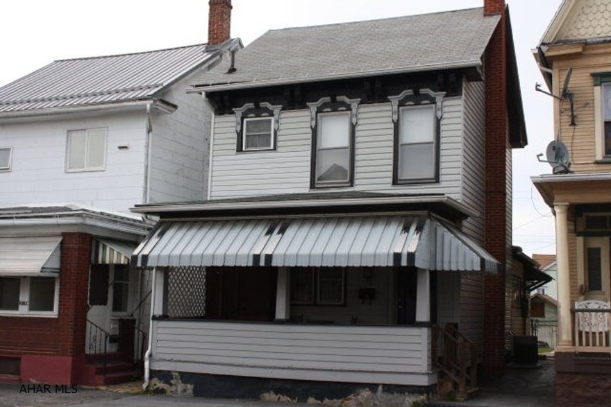 Don't miss this 3 bedroom home priced to sell!  Large updated kitchen, laminated floors, with room for eat-in-area.  New pergo floors in living room and dining room.  Convenient 1st floor laundry.  3 spacious bedrooms and finished bonus room on 3rd floor.  2 car off street parking in rear.  1 year AHS home warranty included!  This home offers more than you can ask for at a fantastic prince!