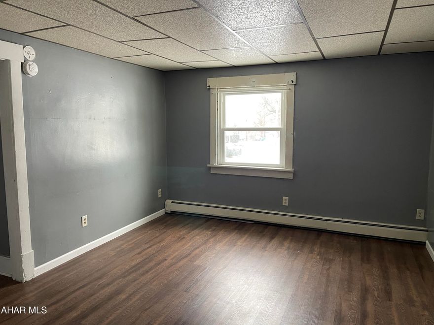 Great investment opportunity. Nicely updated and .  Separate utilities.  First floor is currently vacant, but did rent for 750 per month. Second floor has a tenant, and she pays 750 per month.