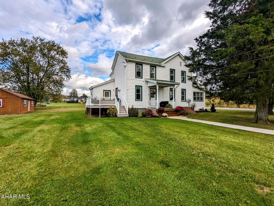 Everyone is looking for a charming Farmhouse, look no further this one comes with 8.253 acres a nice cabin in back, chicken coop and a barn with garage parking. Has electric fencing surrounding the pasture for the cattle. Lovely landscaping and nice garden area. Inside is a nice size kitchen , newly updated laundry room/ mudroom with 3/4 bath on the main floor. Dining area, living room with wood stove for added warmth, sunporch. Go upstairs to 4 bedrooms and a full bath. Has oil F/A heat and central air. New mini split for heat and air added to new laundry room. Beautiful views in all directions. Book an appointment to take your tour.