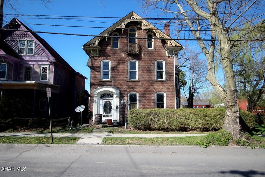 This stately brick Victorian offers timeless charm and a golden opportunity for restoration. With 3 spacious bedrooms on the second floor, 2 additional bedrooms in the attic, and a bonus room on the main floor perfect for a home office or additional bedroom, this home offers flexibility and space for all your needs. Original architectural details, tall ceilings, and solid brick construction set the stage for a stunning transformation. Ideal for investors, flippers, or anyone looking to craft their dream home with historic character. Bring your vision and breathe new life into this grand old beauty!  This property is eligible under the First Look Initiative which expires after 30 full days on market. No investor offers until first look period expires.  No offers regardless of buyer type will not be negotiated within the first 7 days of listing.
