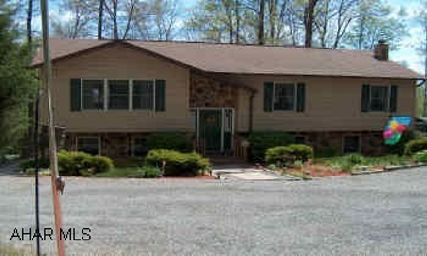 beautiful split entry home with so many upgrades- must be seen! 10 x 20 coverlet, gazebo, fire ring. beautifuly landscaped.  2nd lot is 304 Turkey Ridge Road Beautiful split entry home with so many upgrades- must be seen! 10 x 20 coverlet, gazebo, fire ring. beautifuly landscaped. Kitchen cabinets in basement will be replaced.  2nd lot is 304 Turkey Ridge Road