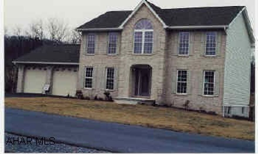 2 Story New Brick and Vinyl Traditional with 2 car attatched garage.