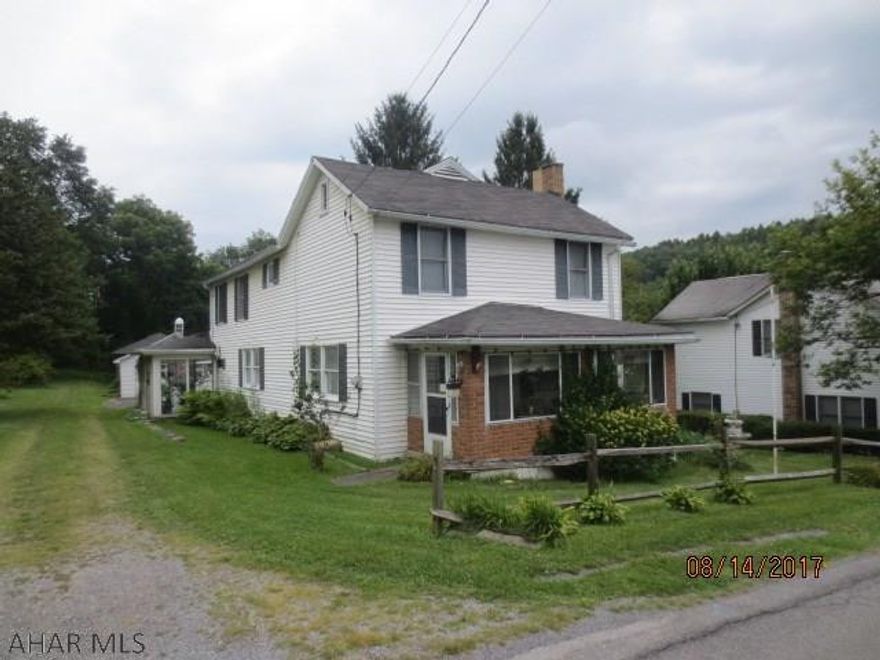The subject property sits in a quiet location on the outskirts of town.There is an outbuilding but it is in poor condition. There is also a coal furnace but it is not functional.