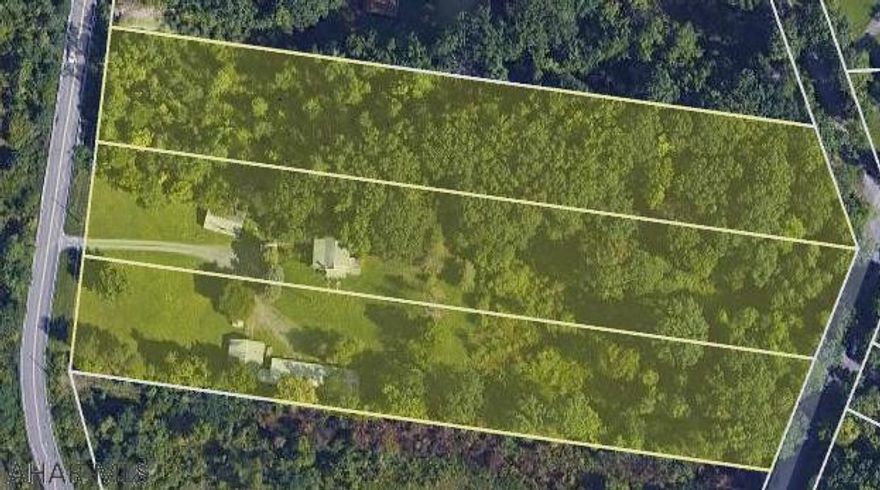 A once in a lifetime chance to own property close to the booming economy of the Logan Town Centre shopping commons.  This lot is perfect for your future business, or a home with super easy commuting to all major roadways in our area.  Three parcels totaling 6.5 acres with garages, a home, and road access await your plans.