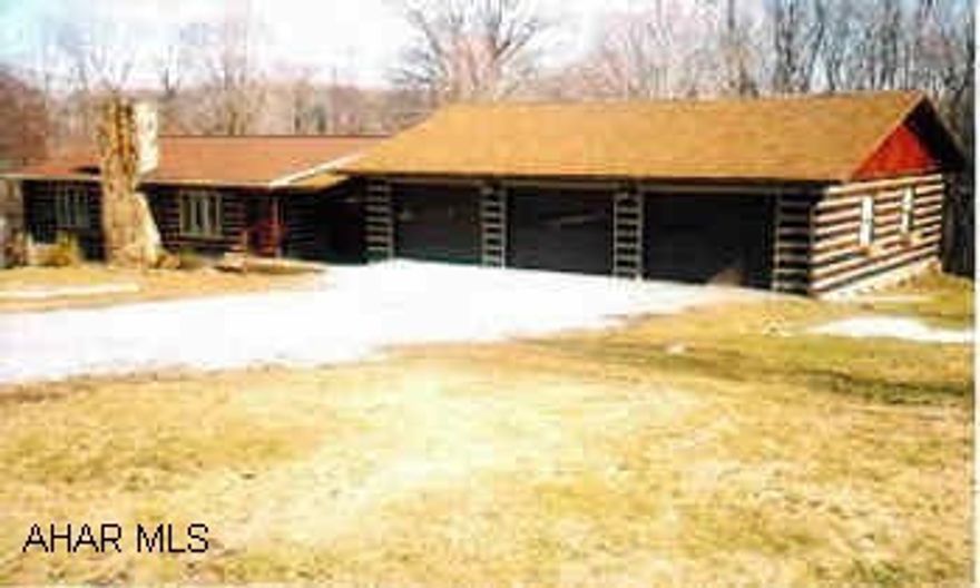 Lovely 3 bedroom, 1 3/4BA, log home on 1.09 acres in HASD, large 3 bay garage with storage.  Motivated sellers.
