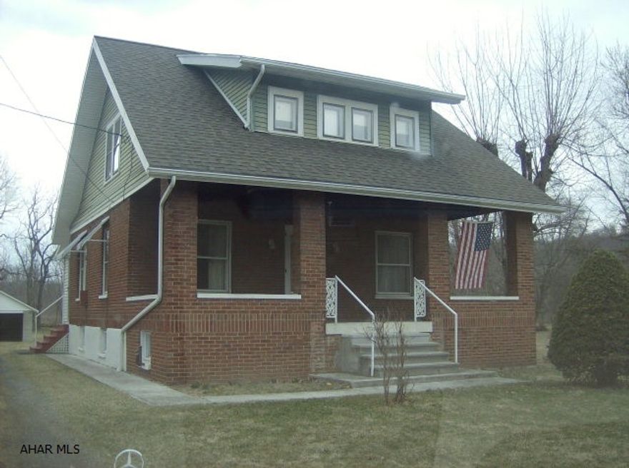 This brick and vinyl home is situated on a large flat lot, is functionally sound and along with some updating will provide years of comfortable living for the new owner. Previous owners utilized the bonus room on the main floor as a third bedroom. The stove and hot water heater are propane. As with all properties the exact boundaries of a property should be determined by a survey.  The property is conveniently located within minutes of I-99, Wal-Mart, Roaring Spring and Hollidaysburg.