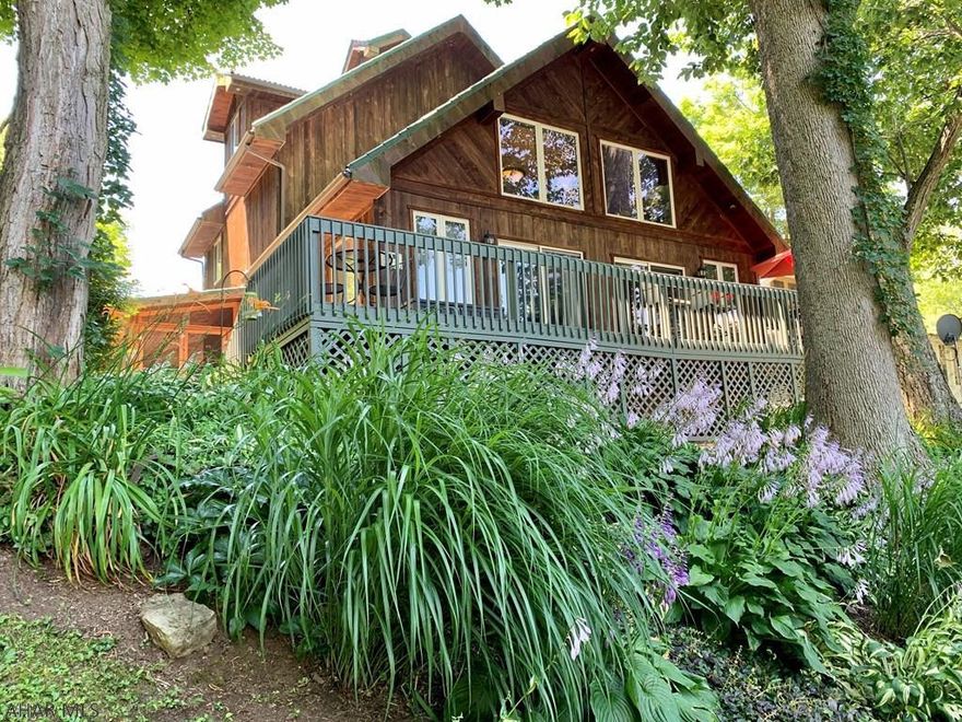 One of a kind home overlooking the Juniata River. If you have been looking for a getaway or full time residence with River frontage, then look no further. This home offers 3 Bedrooms, 2.5 Baths, beautiful custom kitchen with granite counter tops, large windows and patio doors overlooking the river, screened in porch, deck, and much more. This property would make a great place to kick back and relax, with plenty of area to entertain your friends and family. The detached garage would make great boat storage and has potential for an apartment or studio above. Located not far from Raystown Lake and State Game Lands.