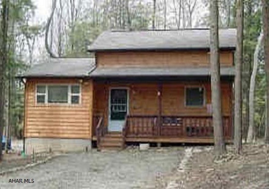 Great get-away, 1 1/2 story log sided 2 BR, 1 bath, nice deck, new carpet Newly painted inside & out. Appliances included. Full finished basement. All the amenities of Glendale Yearound.