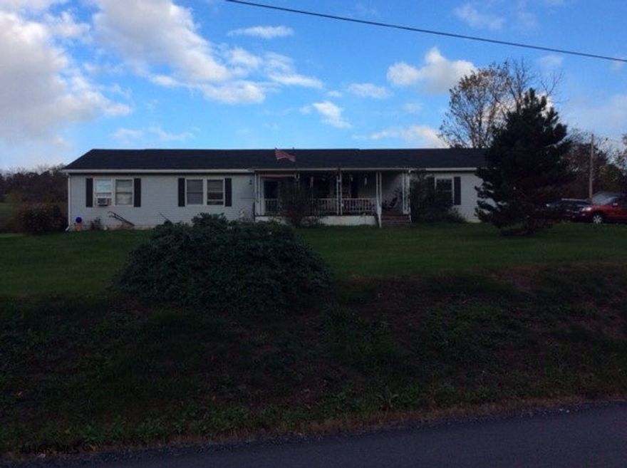 Must see 3 bedroom, 2 bath vinyl sided ranch on 2.48 acres! Newer improvements include interior paint, hot water tank, garage doors, dishwasher, kitchen countertop, bathroom flooring, main bath mirror, cabinet and countertop.