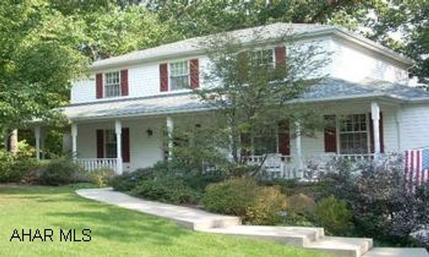 Survey on file. Emphasizing Quality! This wonderful custom built home is in immaculate condition & impeccably maintained. The warm and welcoming style of this home is situated on a 1.5 AC tree studded lot with a delightful stream meandering through the back of the private wooded  yard. A peaceful and private view from the rear patio and deck are great for entertaining.Wonderful informal living room w/ brick fireplace opening to the eat-in kitchen  creates a flowing traffic pattern. The lower level family room has French doors to the back patio - great place for a hot tub! Gas hot water heatw/ 3 zones and Central Air are just a few of the amenities of the terrific home. Call Dianne 814-329-1856. Survey on file.