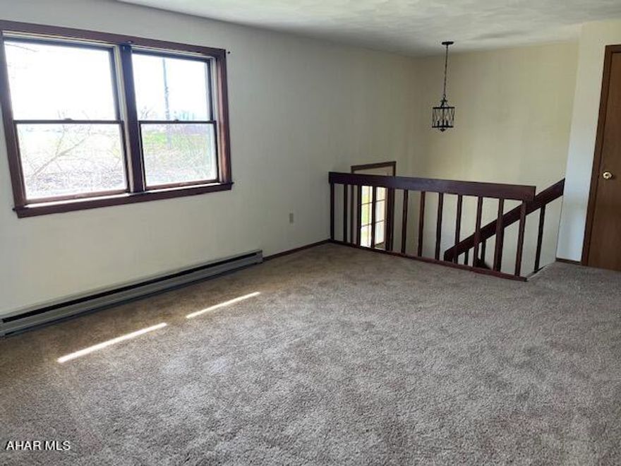 Updated bi-level on nice lot in Woodbury. All new flooring and paint throughout. Family room and 3/4 bath in basement. Large deck on he rear of the home.