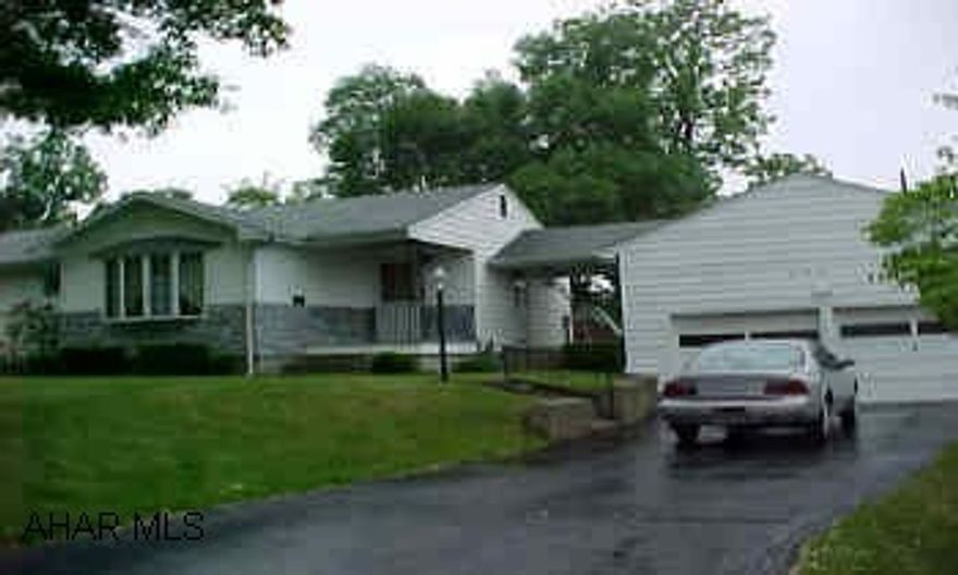 Nice three bedroom rancher.  Hardwood floors in bedrooms.  Nice hardwood floors thruoghout.  Large lot -- 100'x120' and nice two car detached garage.