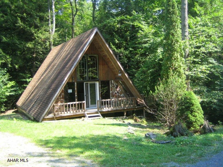 Glendale Year Round A-Frame - Needs some TLC, but could be your perfect retreat. LR with vaulted ceiling, first floor bedroom and bath, loft area, beautiful two-tiered rear deck and secluded setting. Don't miss this one!  HOA dues $425.49 per year include trash removal, pool use, road maint. Property sold AS-IS. Seller will make no repairs. Buyer pays both transfer taxes. Equal Housing Opportunity. Insurable with repair escrow (see hudhomestore.com for details).