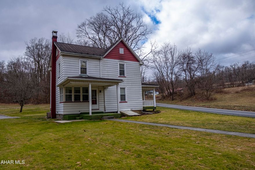 This charming two-story home is situated on a spacious 1.5-acre lot, offering, central air and  plenty of room for outdoor activities and relaxation. The home's inviting covered front porch beckons you inside, where you'll find a comfortable and functional floor plan.

The main level features a cozy living room, perfect for gathering with family and friends, and a spacious eat-in kitchen, ideal for preparing meals and enjoying casual dining. A convenient mudroom provides a designated space for keeping outdoor gear organized.

Upstairs, you'll find three bedrooms, offering ample space for rest and relaxation. The full bathroom is conveniently located on this level, ensuring easy access for everyone.

The detached two-car garage with sliding doors provides ample parking and storage space and a large workshop with a generator hook up.  Also there ia an extra paved parking space. Schedule a tour today.
