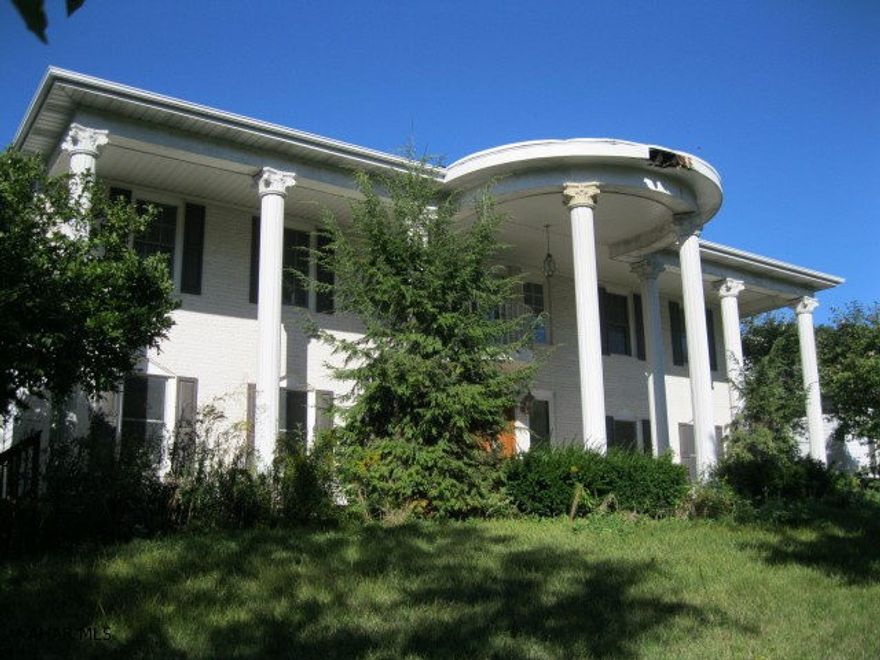 List price of $395,000 is $166,600 under the new assessed value of $561,600. The property needs TLC inside and out with great potential due to location and appeal.