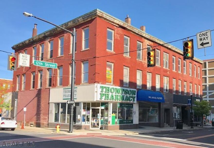 Be a part of the exciting downtown Altoona revitalization with this historic brick building.  The entire second and third floors are waiting for creative minds to restore the huge grand staircase leading to endless possibilities.  Meanwhile, you can collect $3,350 a month rent from the first floor business tenants.  Showings from 9AM-4PM, M-F, for all operating businesses.  Perfect investment for a creative entrepreneur.