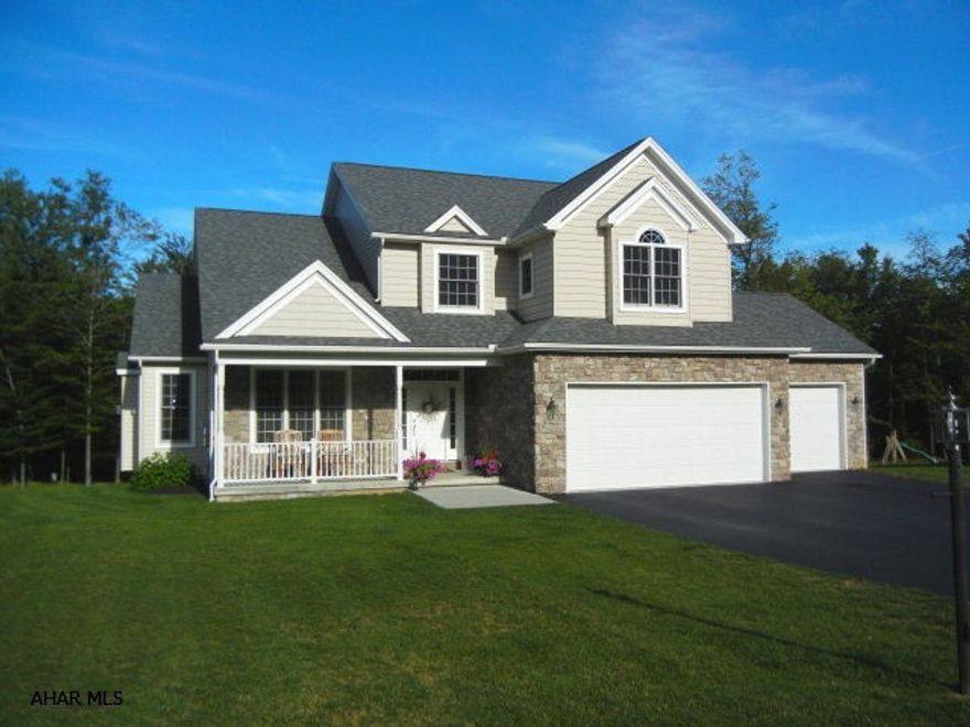 Beautiful quality built home. Custom kitchen features center island w/seating, granite c-tops, pantry, double ovens, hardwood floors. 1st floor laundry with lots of storage. Kitchen appliances stay. Spacious master bedroom with huge walk-in closet. Jetted tub in master bath. 3 other generously sized rooms. 2 types of heat. 2 zones. Heated garage with drains. Level yard. A super nice house!! Some furniture may be available for sale.