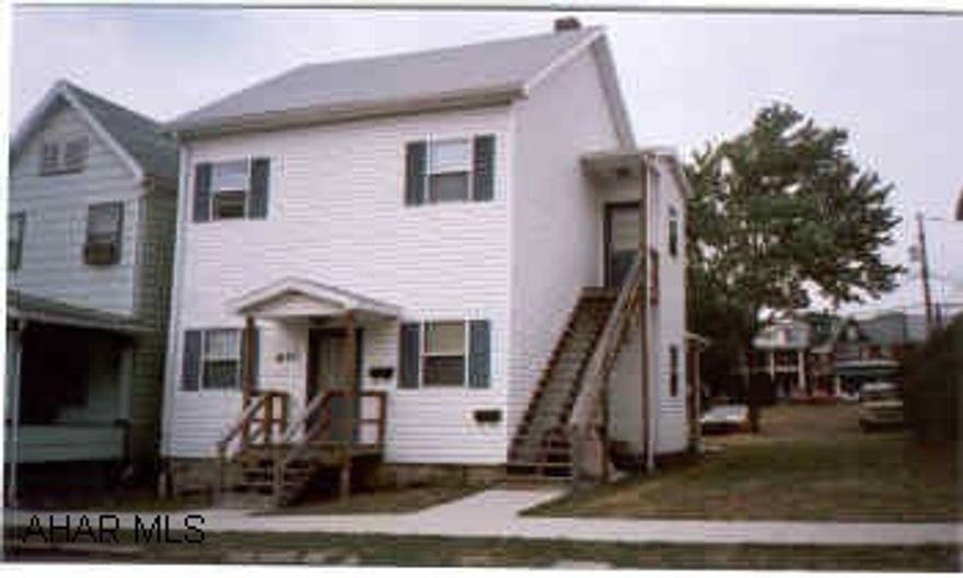 vinyl, laundry in each apt. heat on 2 zones w/ landlord controlled thermostat, 2 hot water tanks, renewed wiring, plumbing, modern kitchen and bath. Rent:  $550 and $567