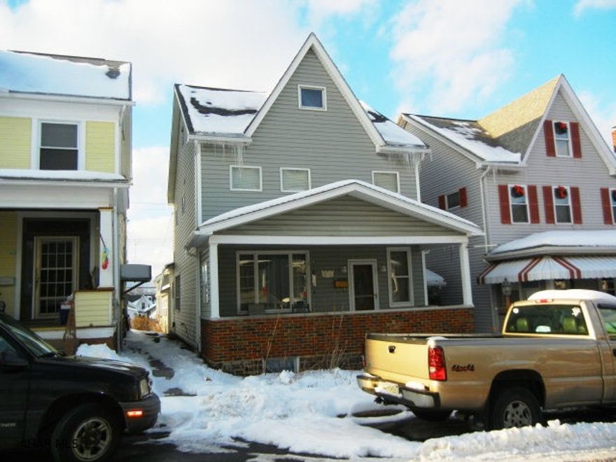 Much charm to this 3+ bedroom, 2 1/2 story home.  Nice hardwood floors.  Beautiful kitchen and more.  Two car garage with workshop.  A great property.