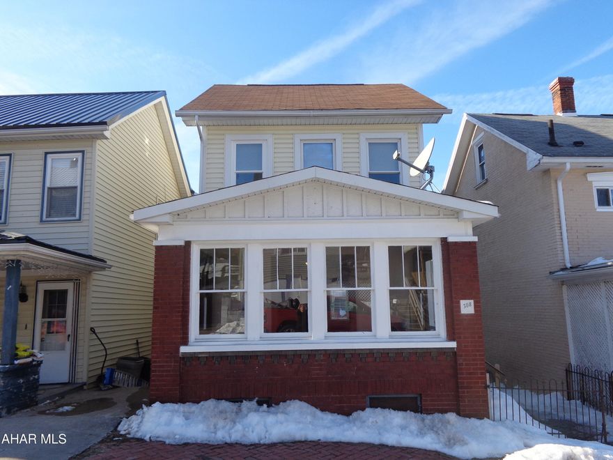 SPRING into your new home! This home is hard to pass up at this price .   All freshly painted and new flooring throughout.  1st floor offers a   spacious eat in kitchen with a built in cabinet, 1/2 bath, dining room, living room, sunroom and a mudroom.  
The 2nd floor has 3 large bedrooms and a bathroom.  
The attic could be made into a 4th bedroom with some remodeling. 
There is a covered patio and a fenced in large backyard.