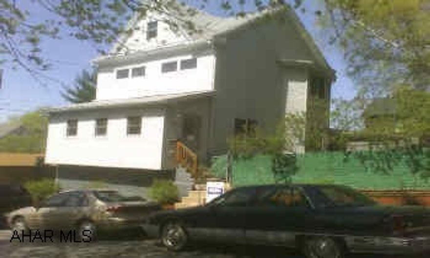 3 STY, 4 BEDROOM WITH FINISHED 3RD FL, 1.5 BATHS, FAMILY ROOM, CLOSED IN FRONT PORCH. REAR PATIO, FENCED LOT. VERY LARGE HOME, MUST SEE.  HOME TOTALLY REDONE IN 2001-FURNACE, DRY WALL, PLUMBING, ELECTR., WINDOWS, SIDING, WATER LINE, AND MORE. 3 STY, 4 BEDROOM WITH FINISHED 3RD FL, 1.5 BATHS, FAMILY ROOM, CLOSED IN FRONT PORCH. REAR PATIO, FENCED LOT.