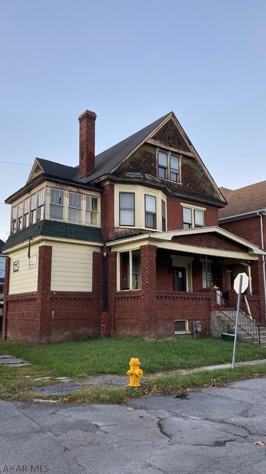 This 3-unit building has LOTS of potential! Needs work to get it back to its stately glory, but could be a GREAT INVESTMENT for someone!