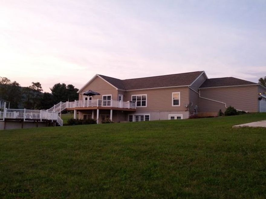 Beautiful 1.7 acre setting. Great view of the mountians from deck. Spacious 1-story home with open floor plan, first floor laundry, finished basement, french doors from family room and master bedroom, above ground pool and 2 car garage. Master bath has garden tub with jets and seperate shower. #J-205