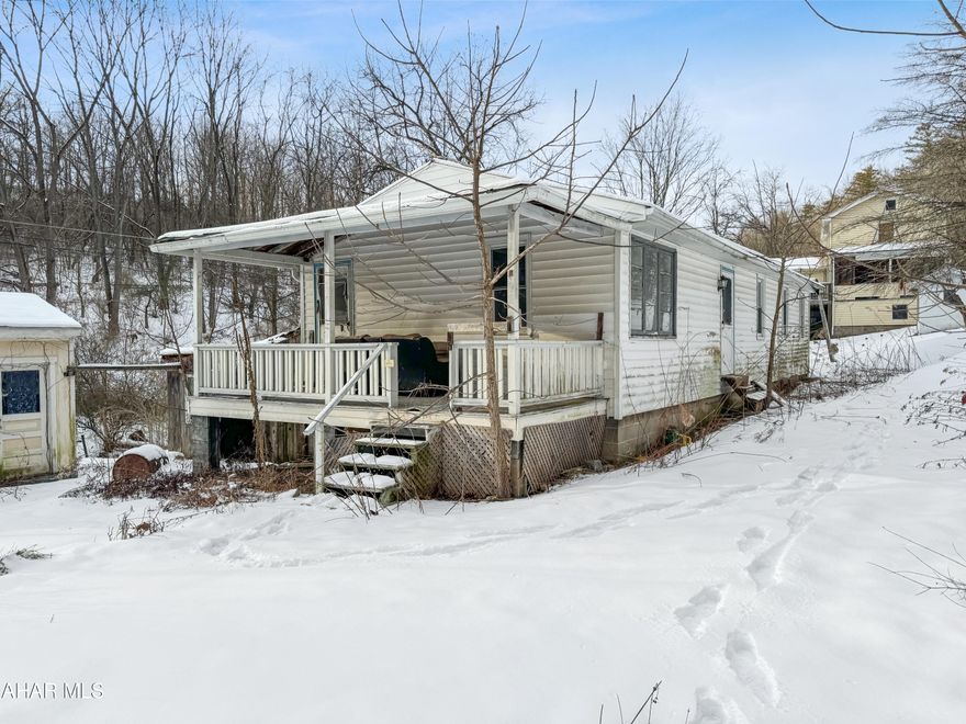 Welcome to 6926 Hungry Hollow Road nestled in the Juniata Valley School District. This charming fixer-upper boasts 2 bedrooms, 1 bathroom, and a thoughtfully designed floor plan. Outside, you'll find a metal roof, off-street parking, a concrete driveway, front covered porch, a serene creek, and countless other amenities. With its potential as a starter home or investment property, this residence holds great potential.