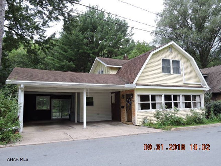 Bring the outdoors in through 2 heated sunrooms & a florida room.  Tons of natural light and views overlooking the big yard & beautiful specimen tree.  Well thought out additions add a big 1st floor laundry/mud room and large 1st floor bath with roll-in shower. Nicely laid out oak kitchen with appliances opens to the rear sunroom/breakfast area.  Newer furnace with central air & electronic air cleaner. 8'5 x 12 heated office with outside entrance in basement. This is a super house that won't last long.  Reassessment value is $151,800 with estimated taxes of $1903.  Seller is not appealing.