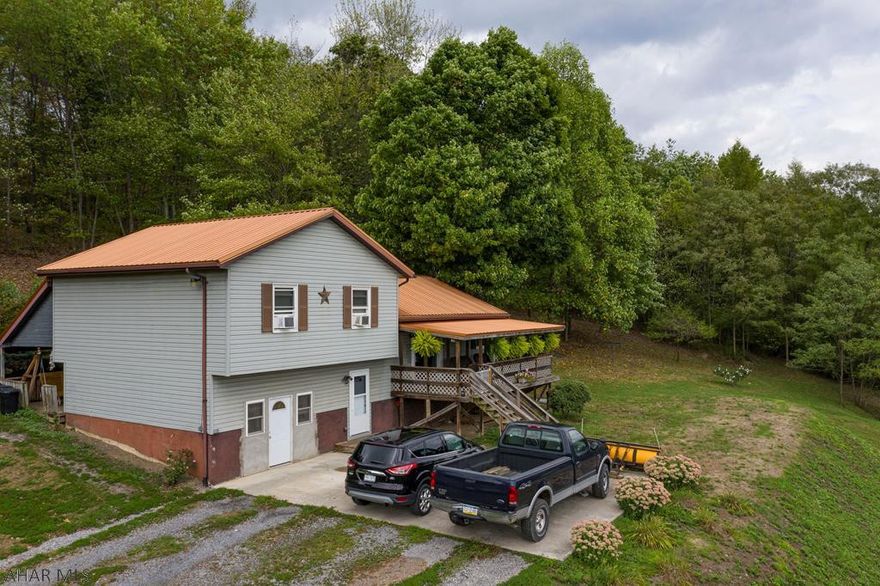 Beautiful Split level home in a nice rural area. Open concept Kitchen, dining, & Living Room Area. 3 Bedroom , 2 Full Bath . Master Bedroom has its own Master Bath. Lower level laundry and bonus room. Enjoy time on the front deck or lounge or cook on the back deck. Sheds on the property stay as well, all on 1.41 Acres.