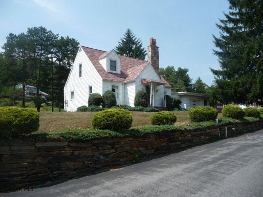 Nice 3BR/3Ba Cape Cod in convenient, close to town location. This home offers a living room with wood fireplace, a basement family room with wood burning stove, office, breezeway, an attached one-car garage and a detached three-car garage with substantial overhead storage. A large paved area for substantial parking is available. HOME Warranty!