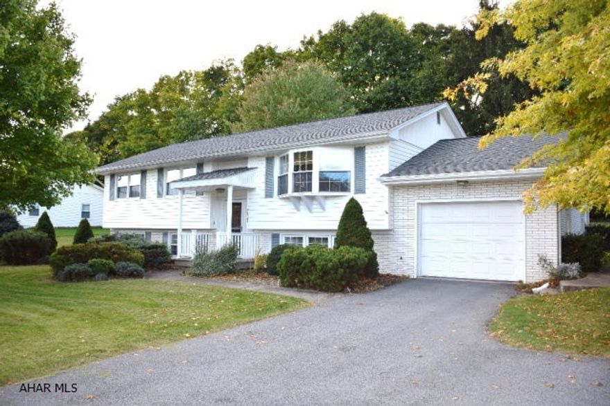 Great bi-level home on large lot. Nice 3 season sun room off dining room.   Lots of space for family and guests with five bedrooms.  Beautiful outdoor space with gazebo.