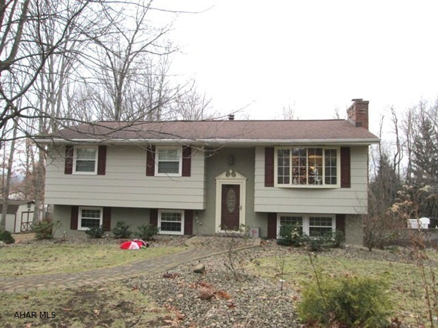 Greenwood. Four bedroom bi-level on private 1.4 acre lot. This home features newer windows, oak kitchen & family room with gas fireplace. Swim in the heated pool in the privacy of the rear yard.