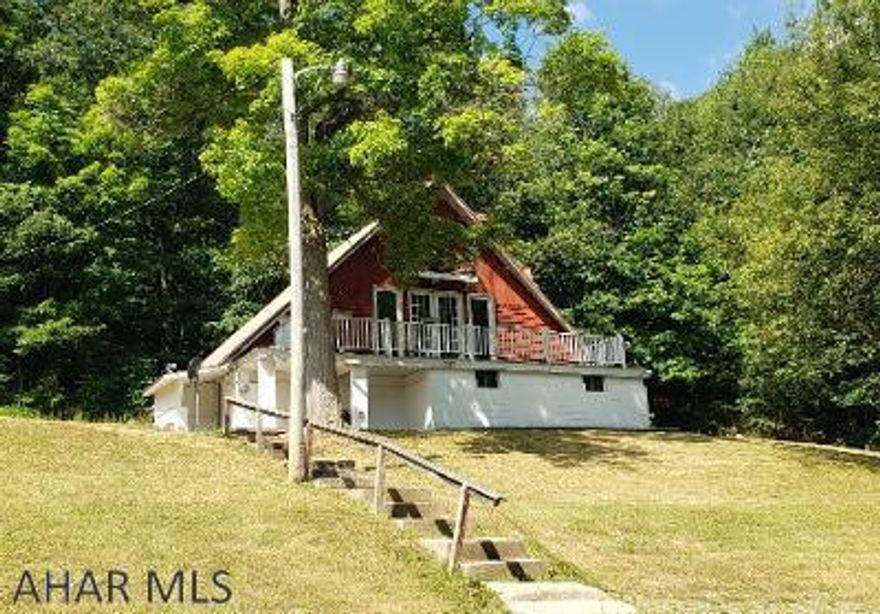 Nice updated A-frame with 5 bedroomsa, 1 3/4 baths, modern Kitchen, 2 fireplaces & basement family room on beautiful 1.03-acre country setting.  J-513