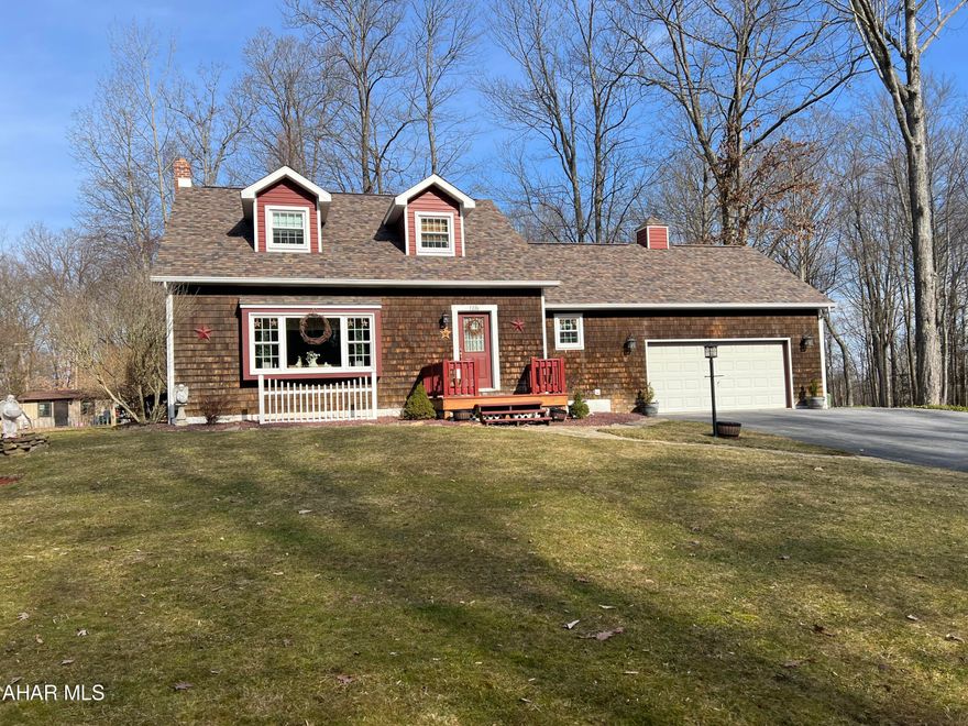 Beautiful Cape Cod on Swartz Road near Prince Gallitzin State Park. This property can declare to be in Glendale Yearound or out (currently out). The home has been well maintained and contains 3 bedrooms, a full and two half bathrooms, oak eat in kitchen, den with fireplace, large living room with hardwood floors, 1st floor laundry and master bedroom. The second floor has 2 bedrooms and a half bath. Mini split air conditioning.  Attached two car garage, Rear deck and fenced in landscaped rear yard for added privacy. Great home for the $$.