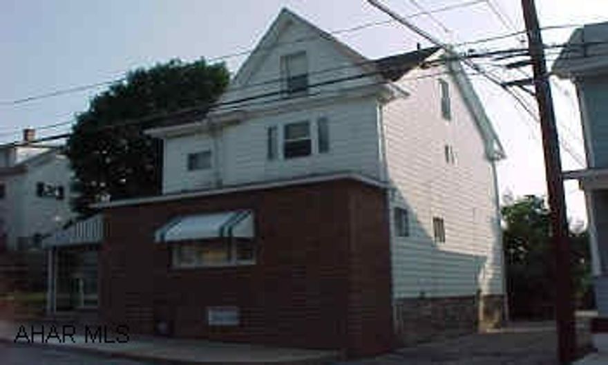 2.5 story, good condition, across from St Leo's Church. 3rd floor is finished. Basement has high clearance.