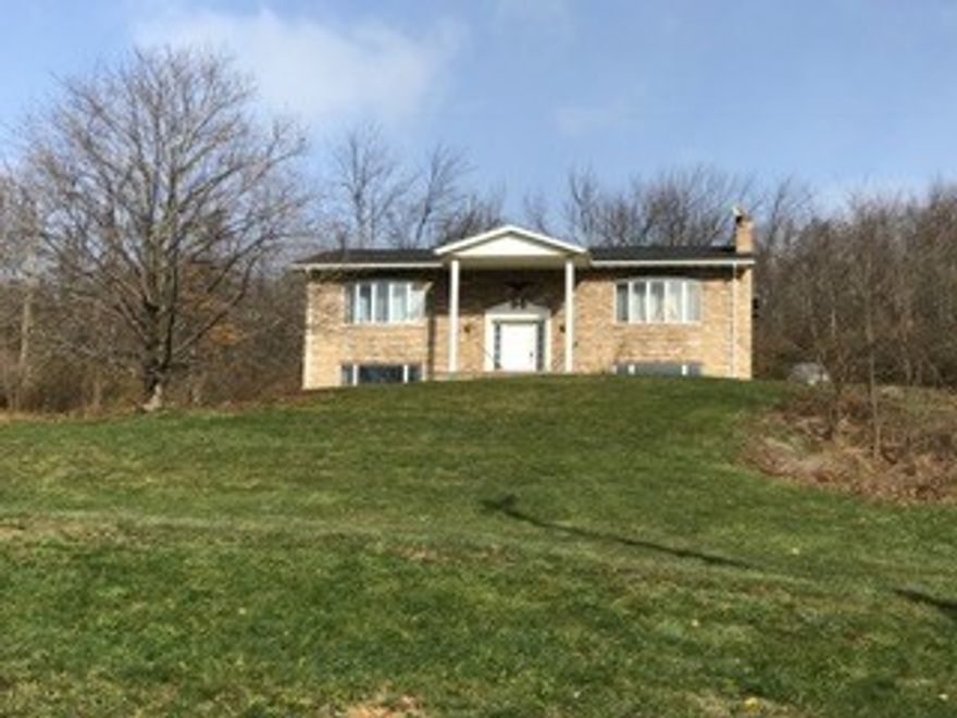 This solid brick home is situated on 2 acres in Allegheny Twp. offers an integral garage that would easily accommodate 4 cars. open living room and kitchen with fireplace and hardwood floors. Large bedrooms, great views!!