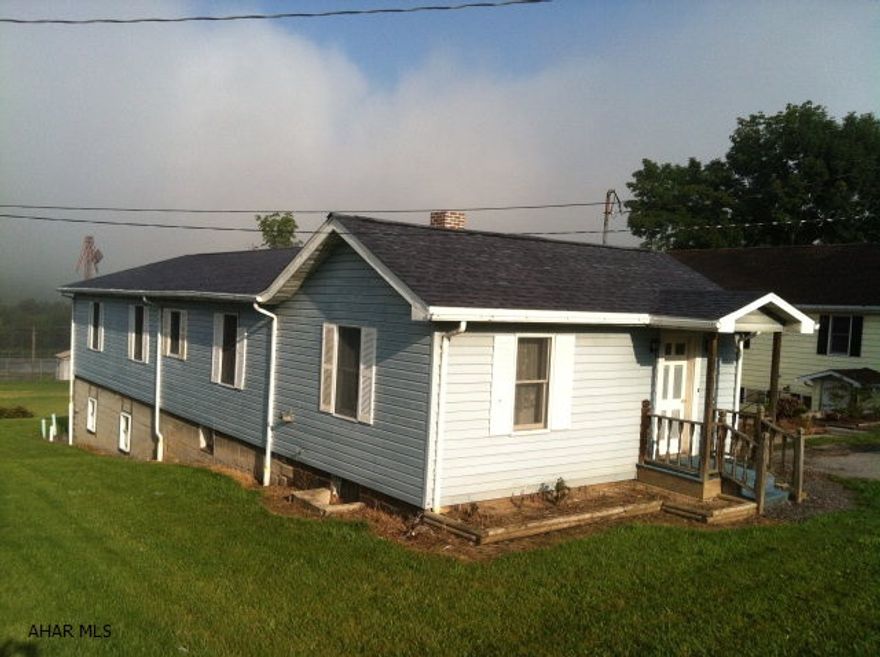 Plenty of outdoor space complements this elevated 3 bedroom, bath-and-a-half, bungalow on Dunnings Highway (Old 220-S) in the Hollidaysburg School District.  A brand new roof and Anderson thermo-pane windows raise it's energy efficiency.  And since it is in Blair Township this property could be converted to commercial use or would make a great rental investment property.