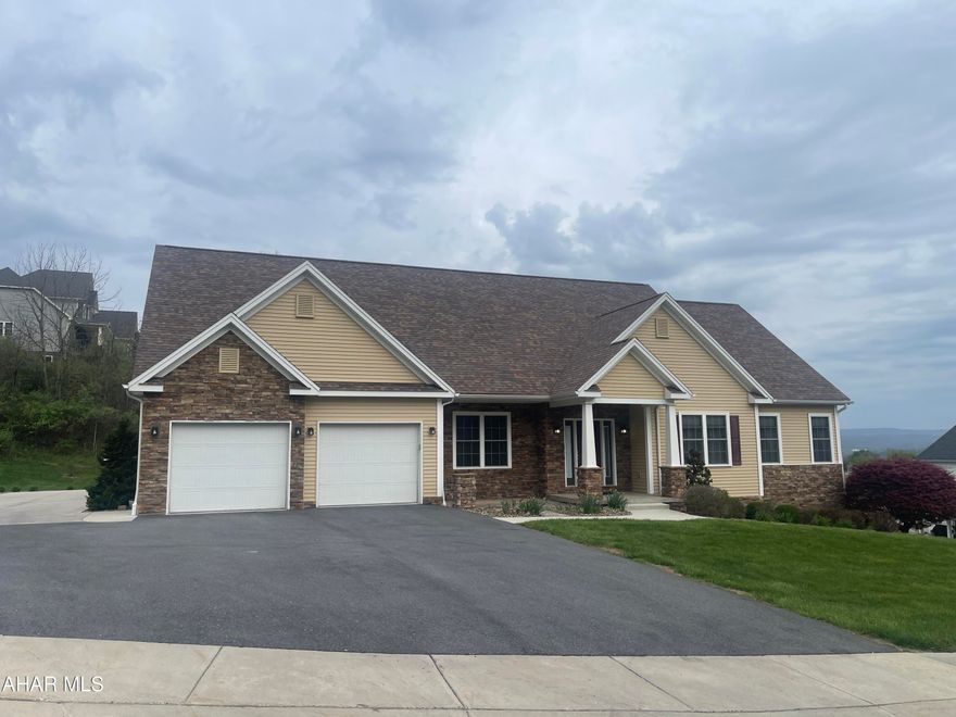 Custom build (Joe Crossman) - Very warm and inviting ''feel'' from the moment you walk through the door.  It was meticulously cared for and it shows.  Hone your culinary skills in the custom kitchen that has been upgraded w/oversized Granite Breakfast Bar, and mostly high end (Thermador) appliances.    Either have a gathering on the covered patio (which also provides a Gas line for a grill) or choose to entertain in the Great Room and enjoy the fireplace.  Beautiful HW flooring, in most of the home.  Amazing space to entertain in the basement as well - that includes a wet bar and is already furnished to start the parties:)   Current sellers have expanded the driveway to allow for RV parking and has the electric hookup necessary as well.  Don't worry about the weather - the 2 car attached garage will protect you from that!  This lovely home is situated on a .61 acre lot.