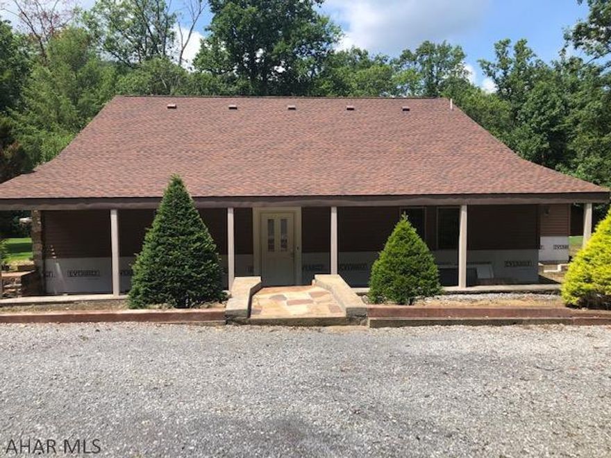 Great opportunity to finish this  home with your own style. Older home that has an addition built on and many updates already completed.  Beautiful stone fireplace in living room, gorgeous ceilings in great room, some building materials stay with property. Property has circular driveway and mature landscaping. Come make this home your dream home.  Listed to sell.