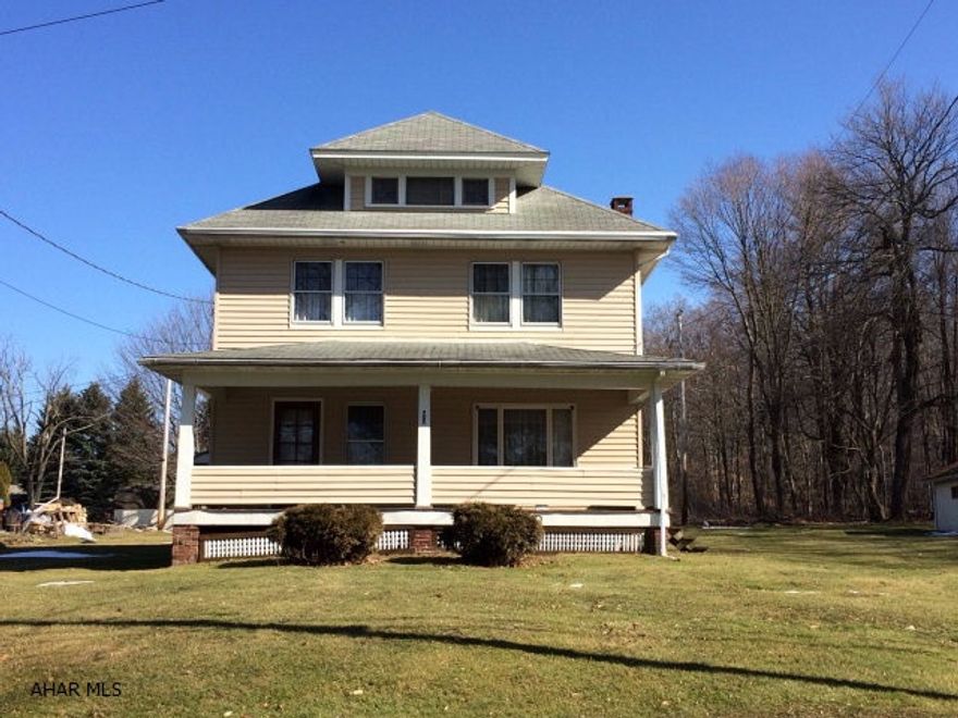 Large 4 bedroom 1 bath home on a large level lot.  This home has spacious rooms and original woodwork throughout the entire house.  The large living room features hardwood flooring.  A very unique feature of this home is a double staircase from both the living room and kitchen.  All four bedrooms have large closets.  Owners have had a recent appraisal done on the property and is priced to sell.