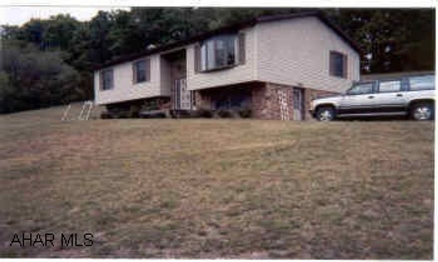 Nice Country setting with 1.8 acres of yard and 2 car det. garage.