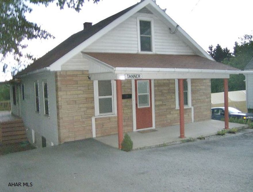 Ebensburg-3-4 BR stone & vinyl sided Cape Cod on nice lot with great view! Remodeled kitchen  with wrap around deck & great view!.