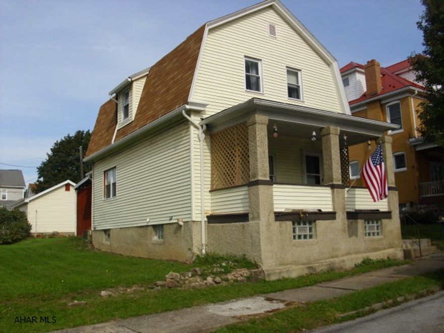 Charming 2 story home with convenient location.  3BR 1.75 Bath, garage.  Modern kitchen and vinyl siding.  First floor laundry room with toilet.  Central air.  Pocket door.