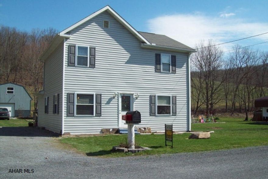 Nice 2-story home w/3 bedrooms and 2-baths. Updated oak kitchen cabinets, thermo pane windows, newer septic system, 24'X 30' detach garage all on 0.92 Ac.