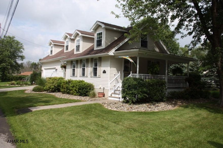 All the room of a suburban home but in the borough of Hollidaysburg.  Close proximity to schools and the YMCA.  Gorgeous landscaped lot with hardscape and outdoor entertaining area.  Inside features hardwood and ceramic floors and lots of light from skylights and abundant windows. Sunroom with fireplace for year round enjoyment.  Family room as well as a living room on the main floor for lots of space.  Large Master bedroom with master bath and a second floor featuring dormers for additional natural light.  Large two car garage with lots of shelving which stays with the home. Includes transferable AHS Home Warranty.  Don't miss out on the opportunity to be near everything but tucked away.  Also 3D tour available for this property check the links.