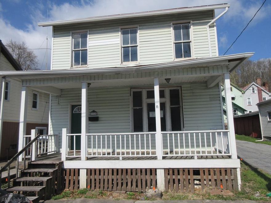 Tyrone Borough 2 story vinyl 2 story home. Wheelchair ramp to exterior entry, large living room, formal dining room. Needs TLC, but a great opportunity for handypersons everywhere!  Property sold AS-IS. Seller will make no repairs. Offers must be submitted through HUD approved broker. Buyer pays both transfer taxes. Exclusive Agency. Equal Housing Opportunity. Marketed by Olympus AMS www.olympusams-re.com. www.HUDHomestore.com