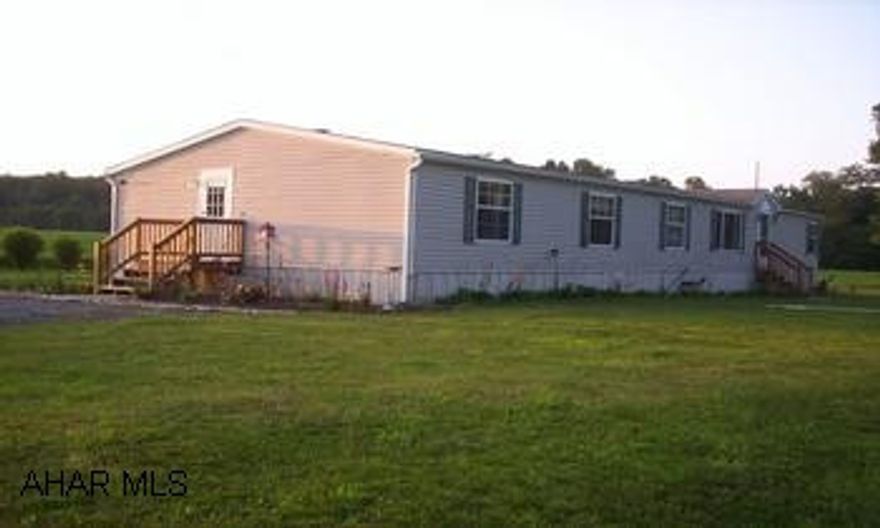 Over 2100 square feet of luxury living space on 4.7 of secluded privacy. Only 20 minutes from Raystown. Over 2,000 square feet of spacious living on 4.7 acres of secluded privacy with a panoramic view of wildlife year round. Eat in kitchen bar w/ skylights, newly renovated Dining Room, fireplace and large master suite w/ garden tub. If you want luxury living, peace and quiet and country views on a private setting, then this is for you. Within 20 miles from Lake Raystown and Trough Creek.